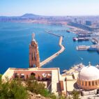 panorama photo of Santa Cruz fort of Oran, a coastal city of Algeria , Mountain top cathedral and panorama skyline view of Oran